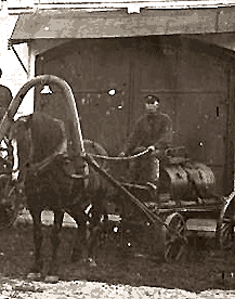 Пожарная телега с бочкой для воды. 19 век